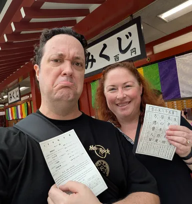 Anna & Levi with paper fortunes