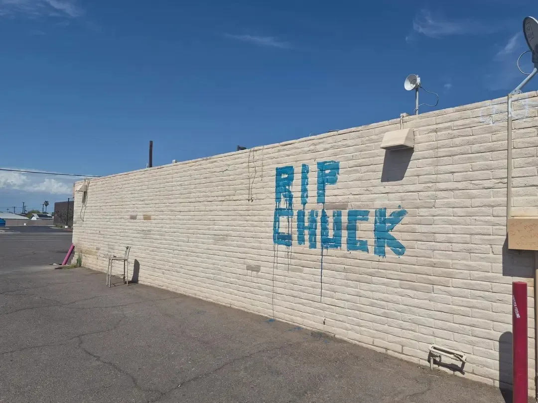 Grafitti on the side of the closed Palo Verde Lounge: RIP Chuck
